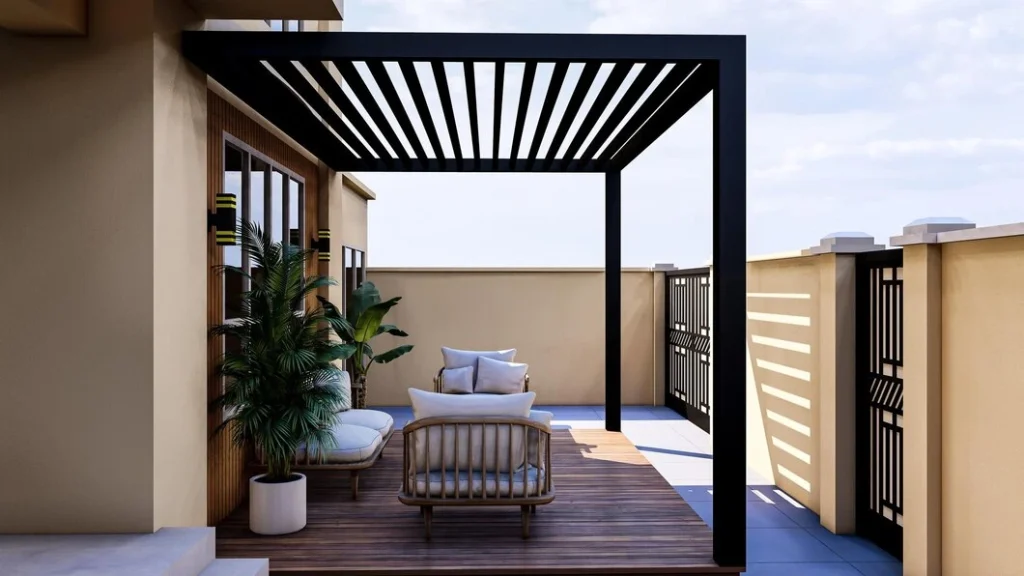 Modern rooftop pergola with a sleek black frame and slatted roof, providing shade over a cozy outdoor seating area featuring neutral-toned furniture and lush potted plants, offering a stylish retreat.